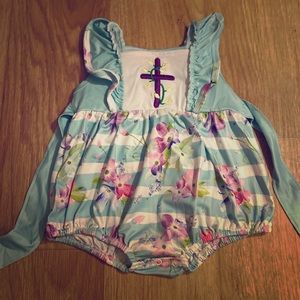 Cross onesie